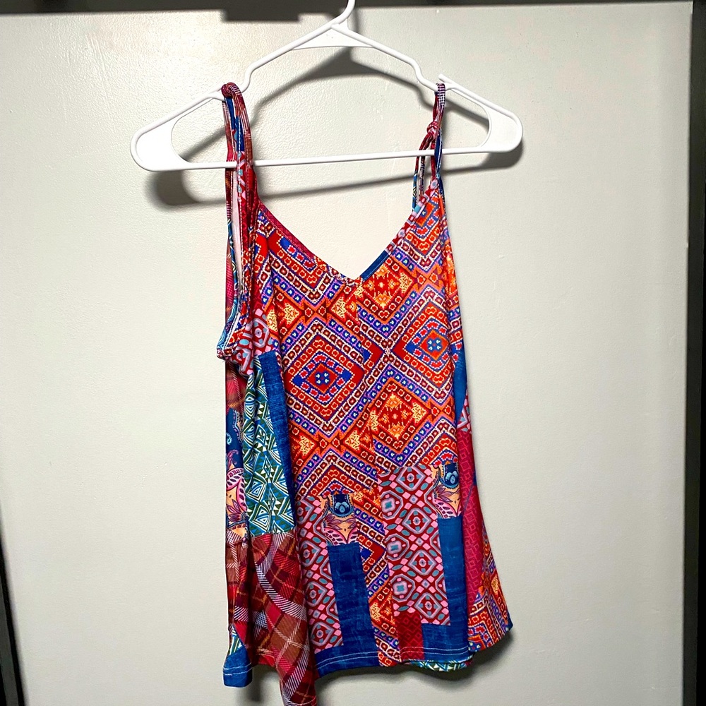 Spaghetti strap, tied at shoulders tank top. Camisole swing top.